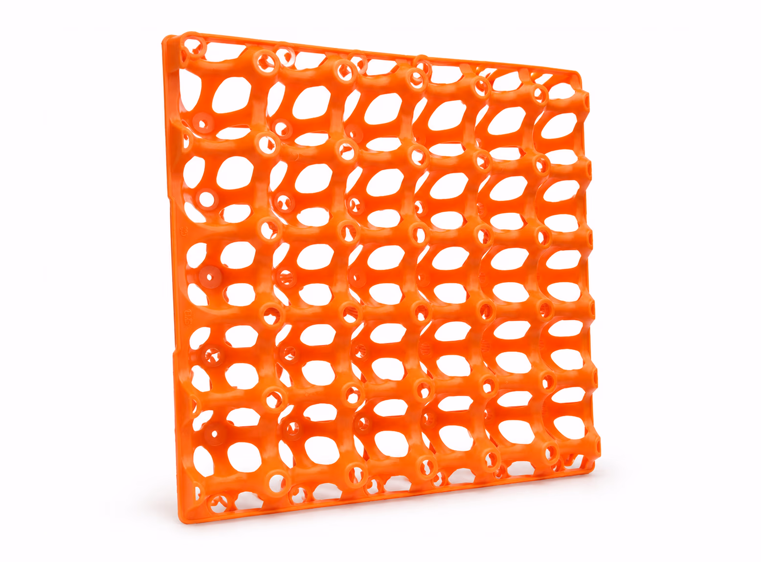 Orange plastic grid with diamond-shaped holes standing upright on white background.